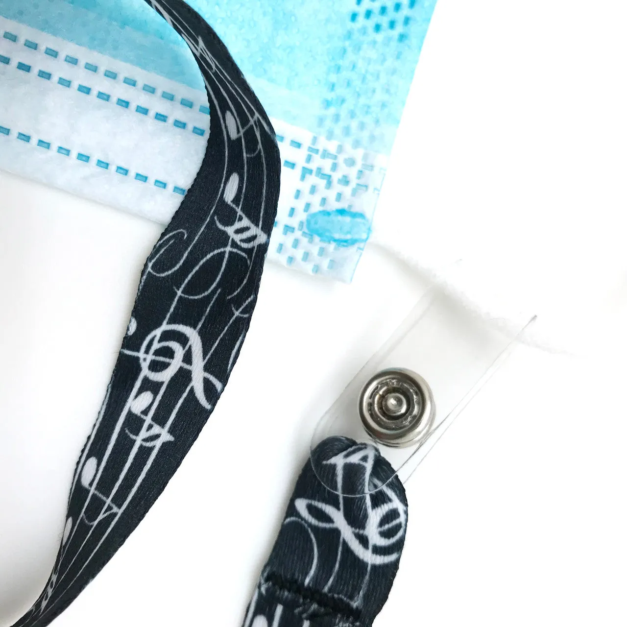 Musical Notes Face mask holder lanyard 24" long in with vinyl snap fittings printed on 5/8" Ultra Lanyard fabric